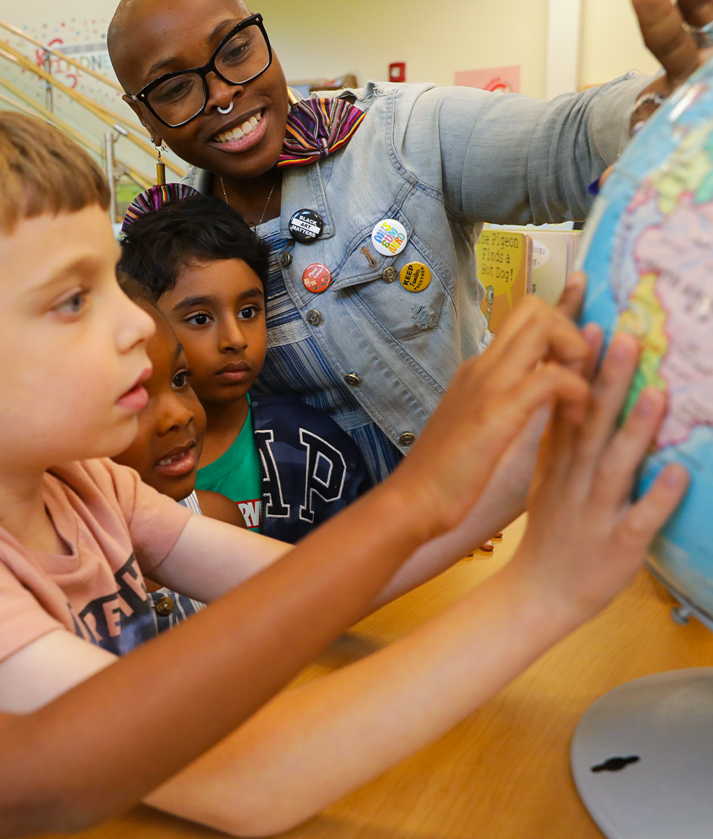 Teacher with Globe